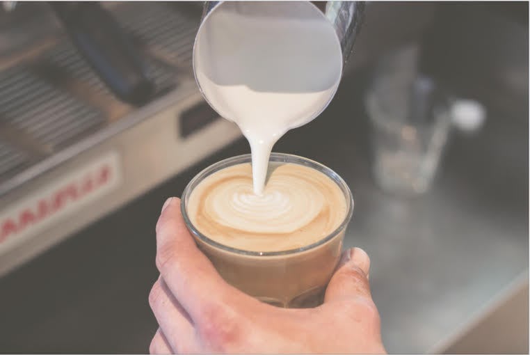 Coffee in a designer workspace